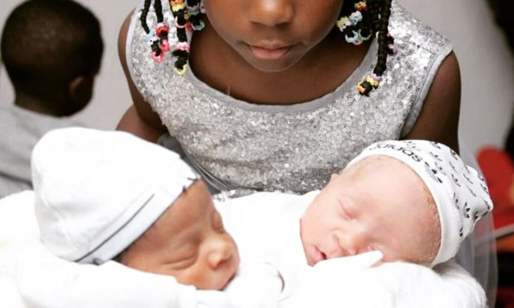 Black Mom And Dad Have Black And White Twins